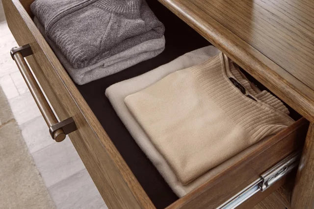 https://cdn.ashley.com/assets/24Q2_ASHNAT_SSNewArrivals_AshComm_PDPImageSet_Bedroom_RoanhoweChestOfDrawers_CloseUpDetails_StorageDrawers.jpg?fit=bounds&width=640&height=480&quality=85&format=webp