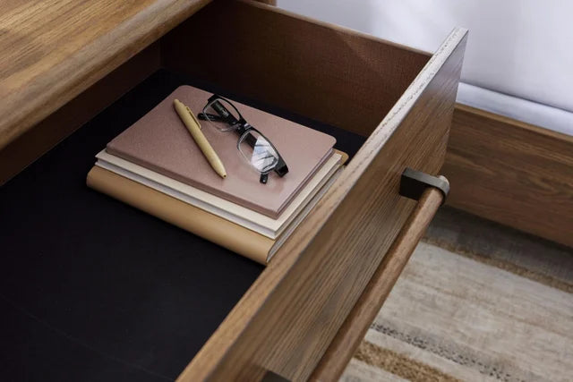 https://cdn.ashley.com/assets/24Q2_ASHNAT_SSNewArrivals_AshComm_PDPImageSet_Bedroom_RoanhoweDresser_CloseUpDetails_FeltLineDrawers.jpg?fit=bounds&width=640&height=480&quality=85&format=webp