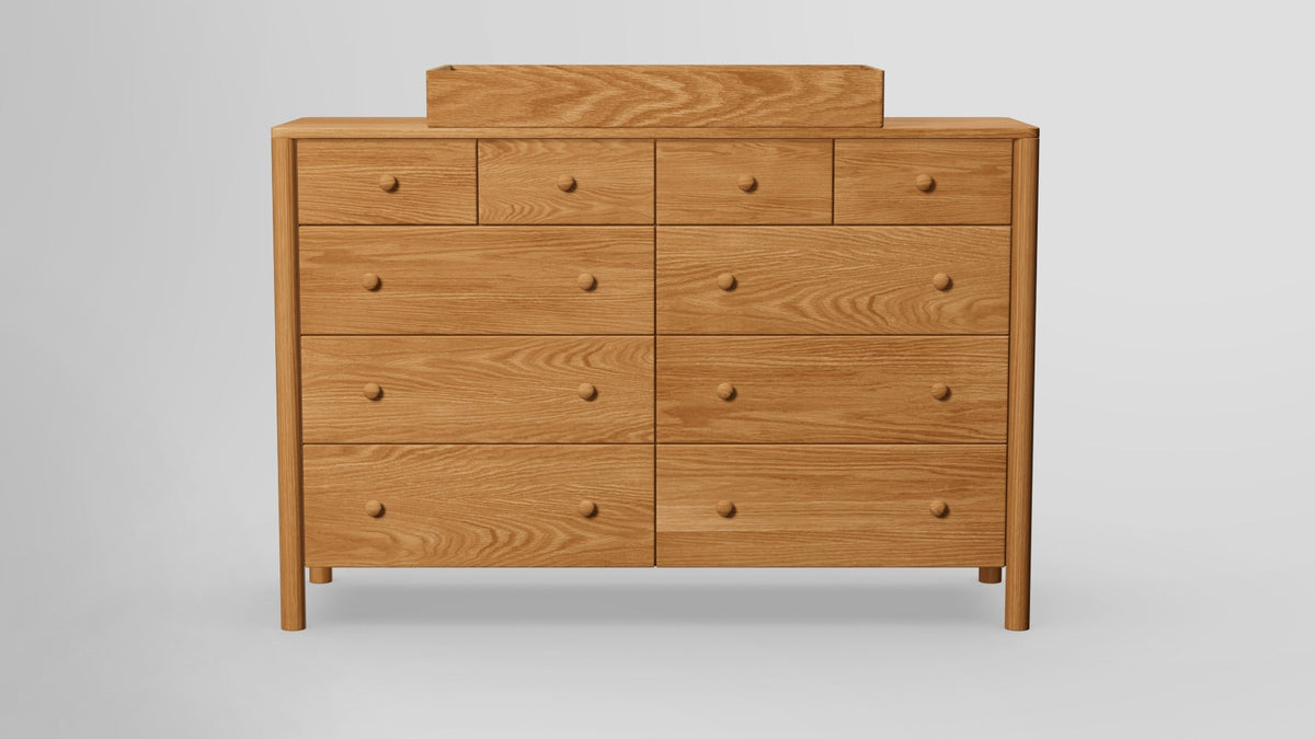 https://cdn.shopify.com/s/files/1/0216/9339/9104/files/ChildsPose_10_Drawer_Tall_Dresser_With_Tray_Redoak_Oilfinished_Front.jpg?v=1763586318