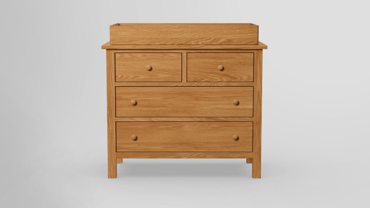 https://cdn.shopify.com/s/files/1/0216/9339/9104/files/Footprint_4_Drawer_Dresser_With_Tray_Redoak_Oilfinished_Front.jpg?v=1762420488