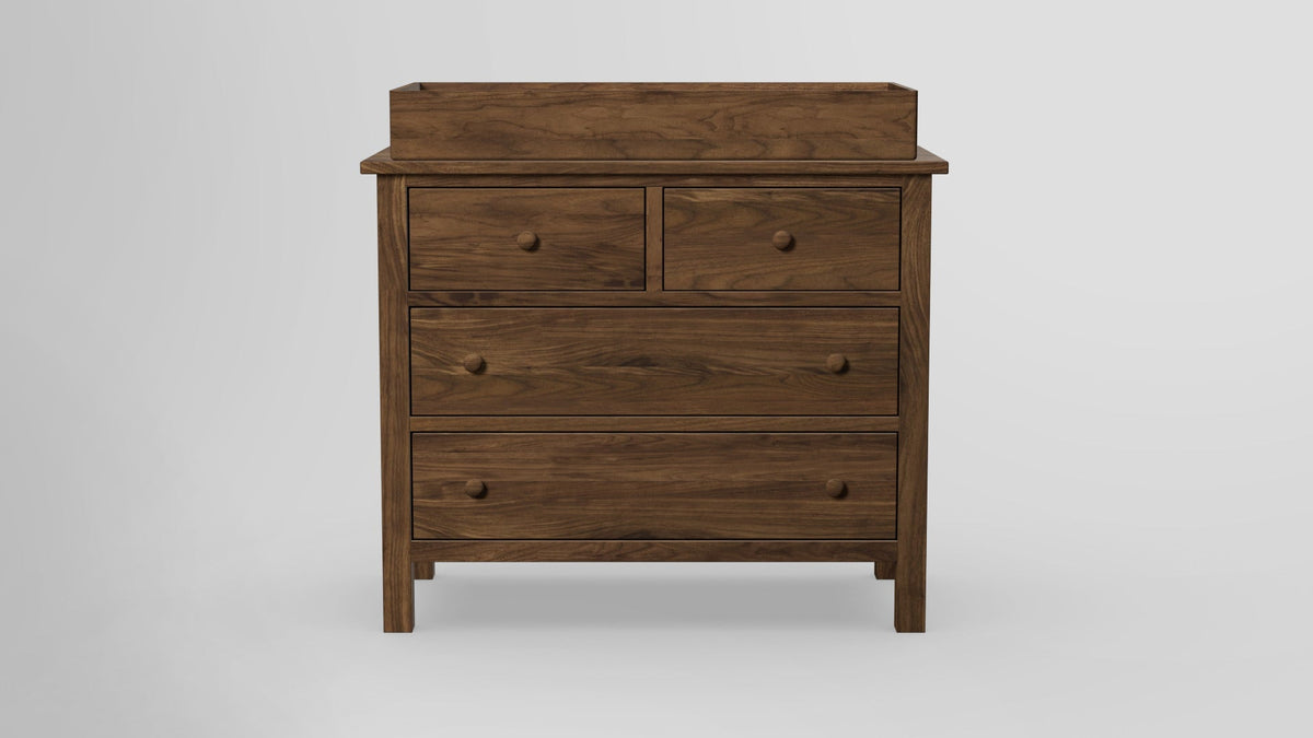 https://cdn.shopify.com/s/files/1/0216/9339/9104/files/Footprint_4_Drawer_Dresser_With_Tray_Walnut_Oilfinished_Front.jpg?v=1762420076