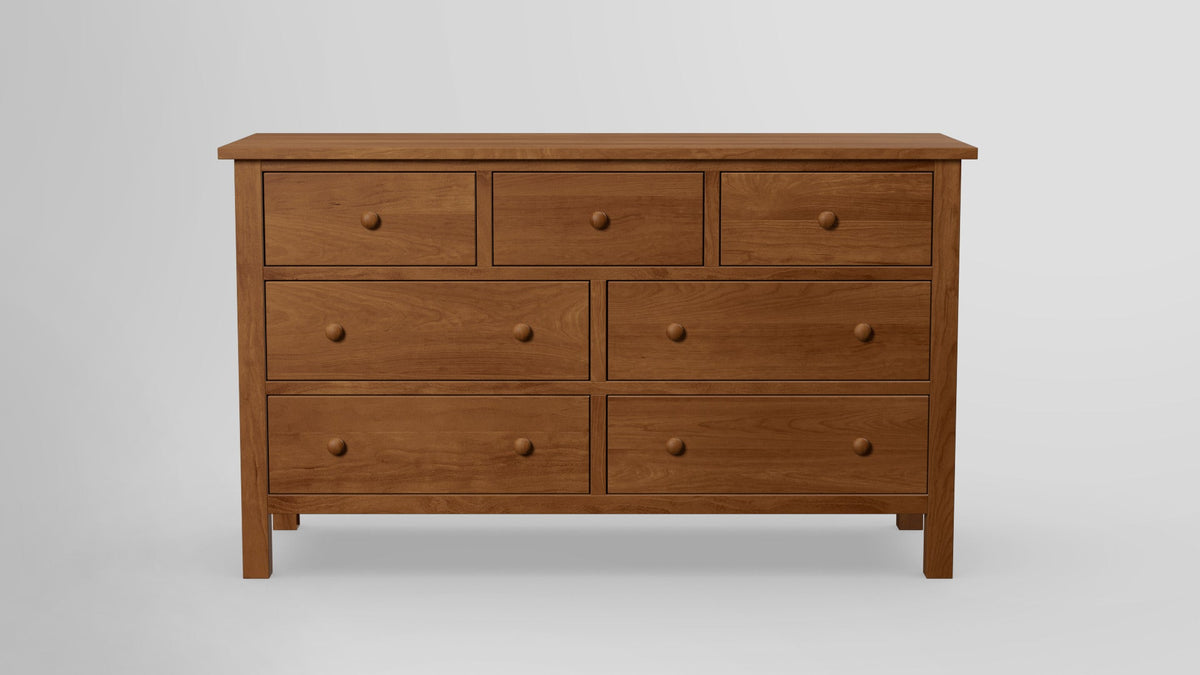 https://cdn.shopify.com/s/files/1/0216/9339/9104/files/Footprint_7_Drawer_Dresser_Cherry_Oilfinished_Front.jpg?v=1762413022