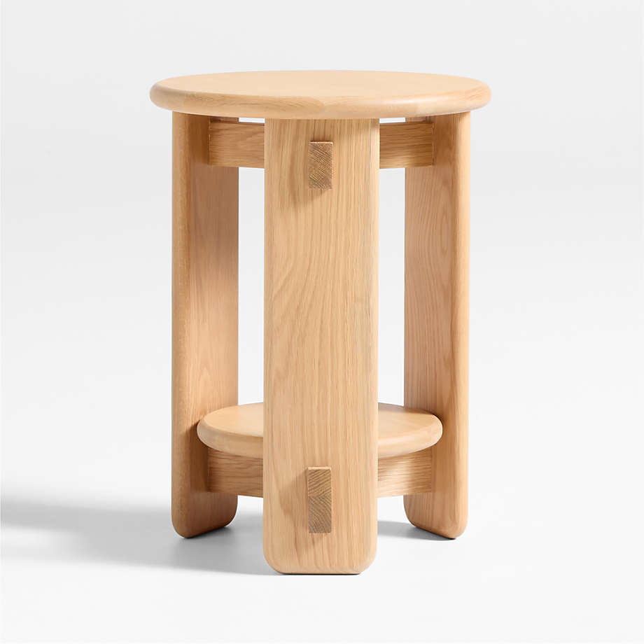 https://cb.scene7.com/is/image/Crate/RowanNatRndNrsrySdTblSOSSS25?$web_pdp_main_carousel_med$