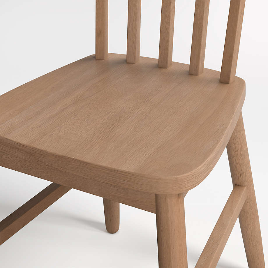 https://cb.scene7.com/is/image/Crate/ShorePlayChairWoodAVSSS23_3D?$web_pdp_main_carousel_med$