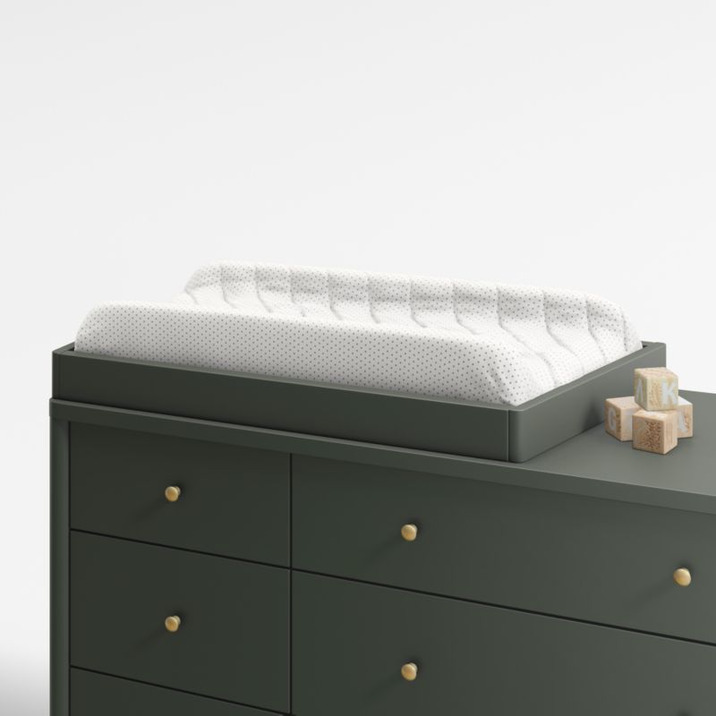 https://cb.scene7.com/is/image/Crate/Hmpshr6DrOvUnvChgTpWhAVSSF21_3D/$web_pdp_main_carousel_lg$/240201113519/olive-changing-table-topper.jpg