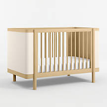https://cb.scene7.com/is/image/Crate/RedondoCrib3QSSS24_3D/$web_pdp_main_carousel_thumb_high$/240201144720/redondo-upholstered-wood-baby-crib.jpg